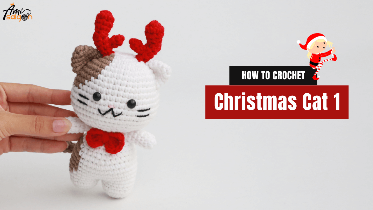 Crochet Christmas Cat with a Red Bow and Reindeer Antlers
